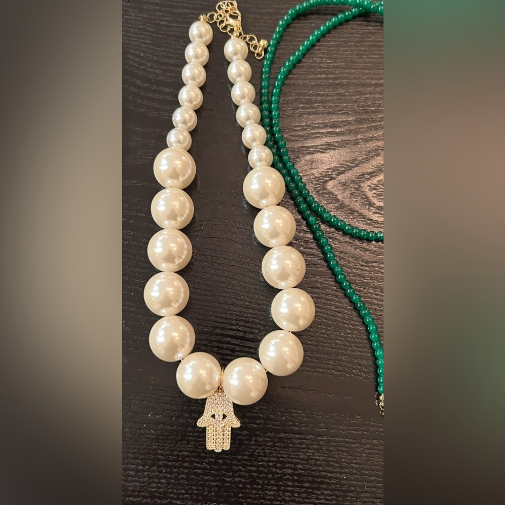 Elegant Pearl Bead Necklace with Hamsa against evil eye.